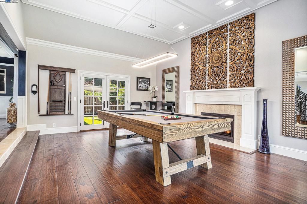Billiard Table, Fireplace, Game Room, Interior, Pendant Lights, Recessed Lighting, Wood Texture Flooring