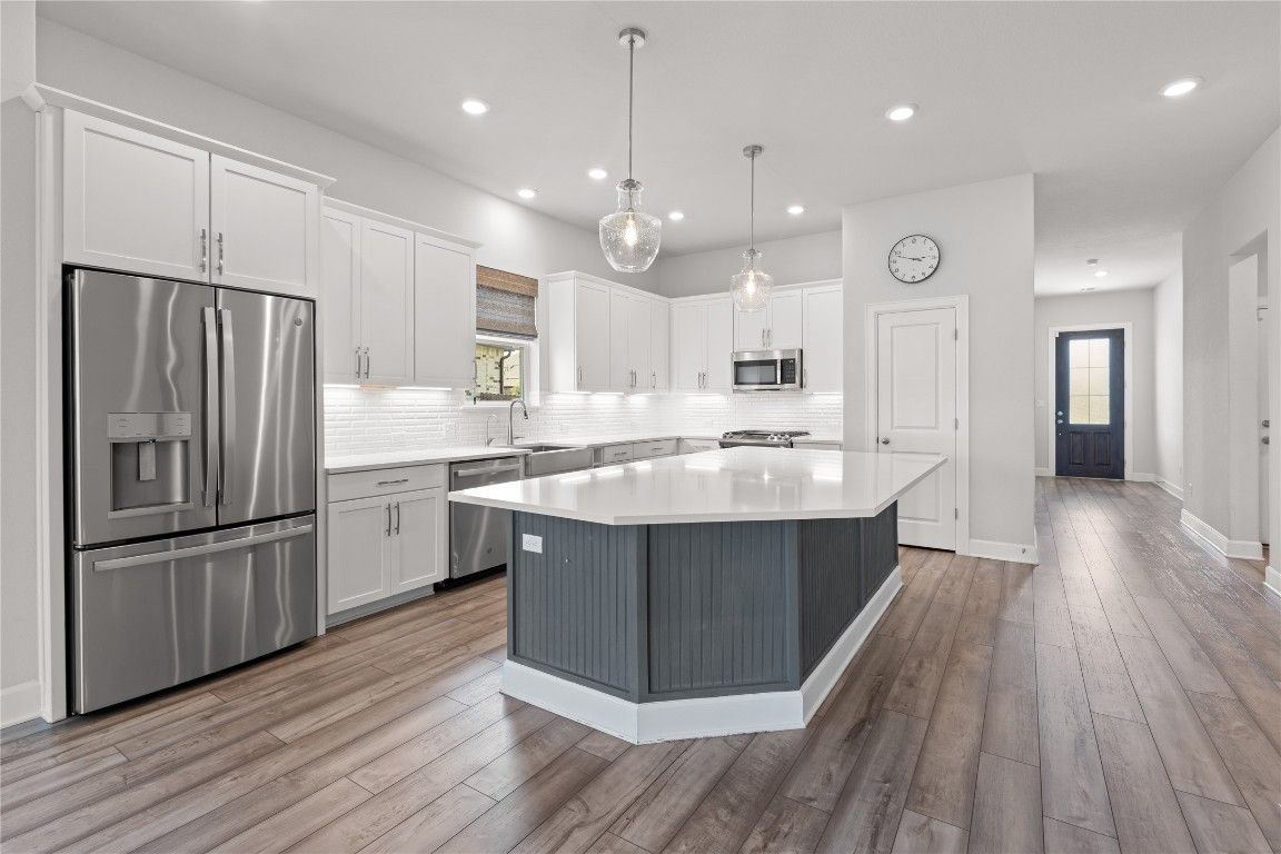 Interior, Kitchen, Pendant Lights, Recessed Lighting, Stainless Steel Appliances, Wood Texture Flooring