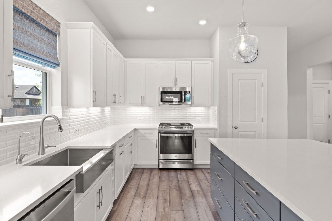 Interior, Kitchen, Pendant Lights, Recessed Lighting, Stainless Steel Appliances, Wood Texture Flooring