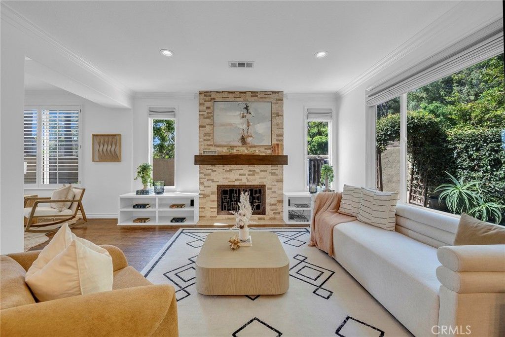 Fireplace, Interior, Living room, Recessed Lighting, Stone Walls, Wood Texture Flooring