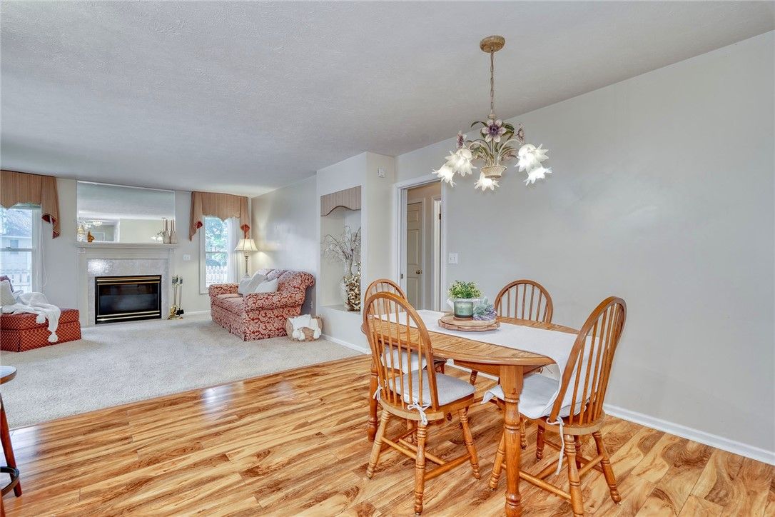 Chandelier, Dining room, Fireplace, Interior, Pendant Lights, Wood Texture Flooring