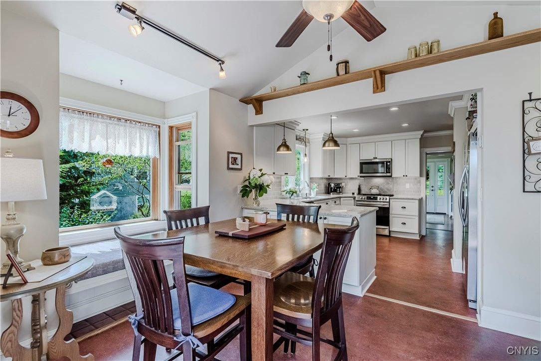Dining room, Interior, Kitchen, Pendant Lights, Recessed Lighting, Stainless Steel Appliances, Wood Texture Flooring