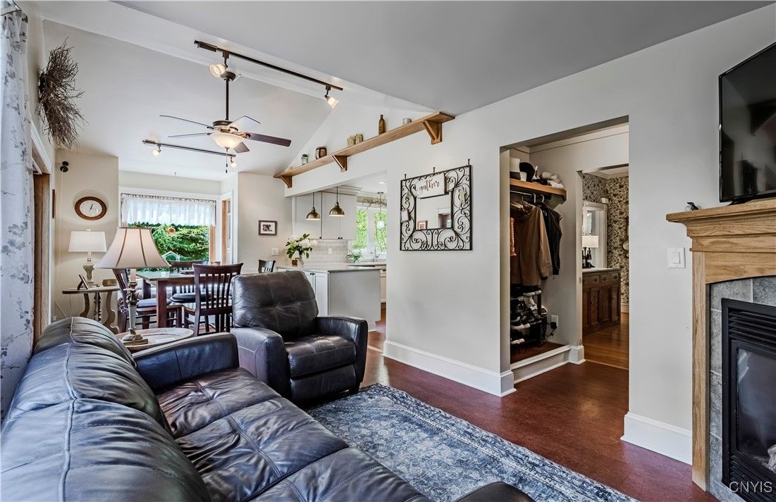 Dining room, Fireplace, Interior, Kitchen, Living room, Pendant Lights, Wood Texture Flooring