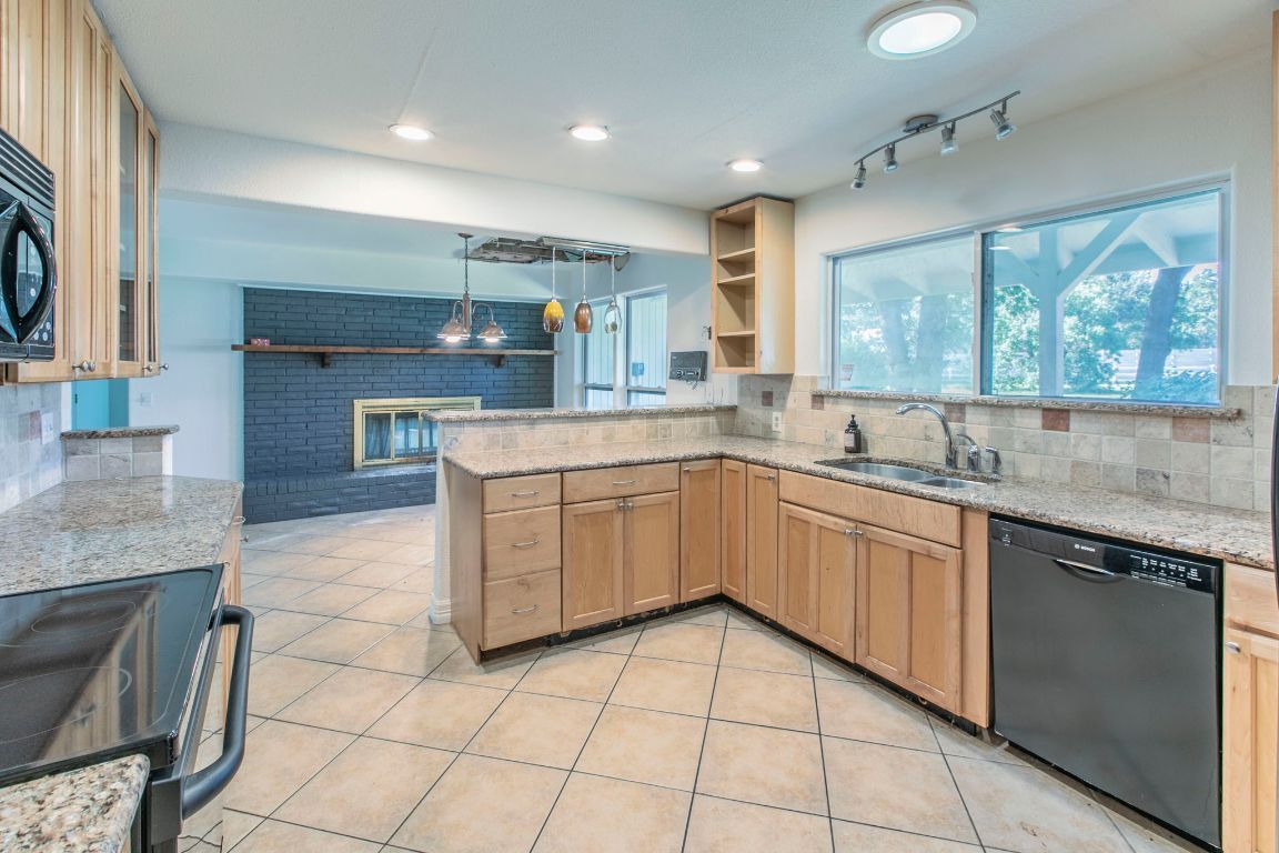 Fireplace, Interior, Kitchen, Pendant Lights, Recessed Lighting, Stone Walls