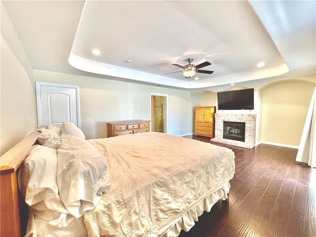 Bedroom, Fireplace, Interior, Recessed Lighting, Wood Texture Flooring