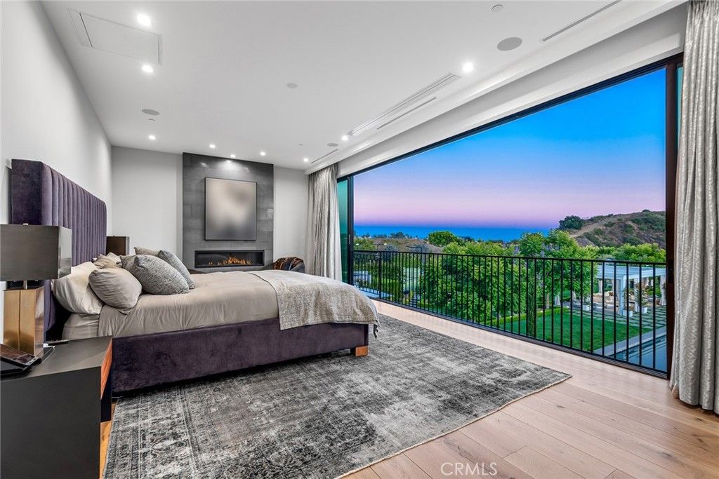 Bedroom, Fireplace, Interior, Recessed Lighting, Water, Wood Texture Flooring