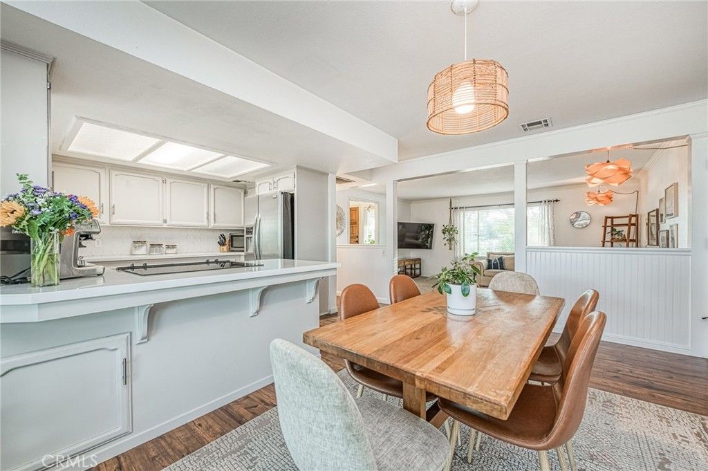 Dining room, Interior, Kitchen, Pendant Lights, Stainless Steel Appliances, Wood Texture Flooring