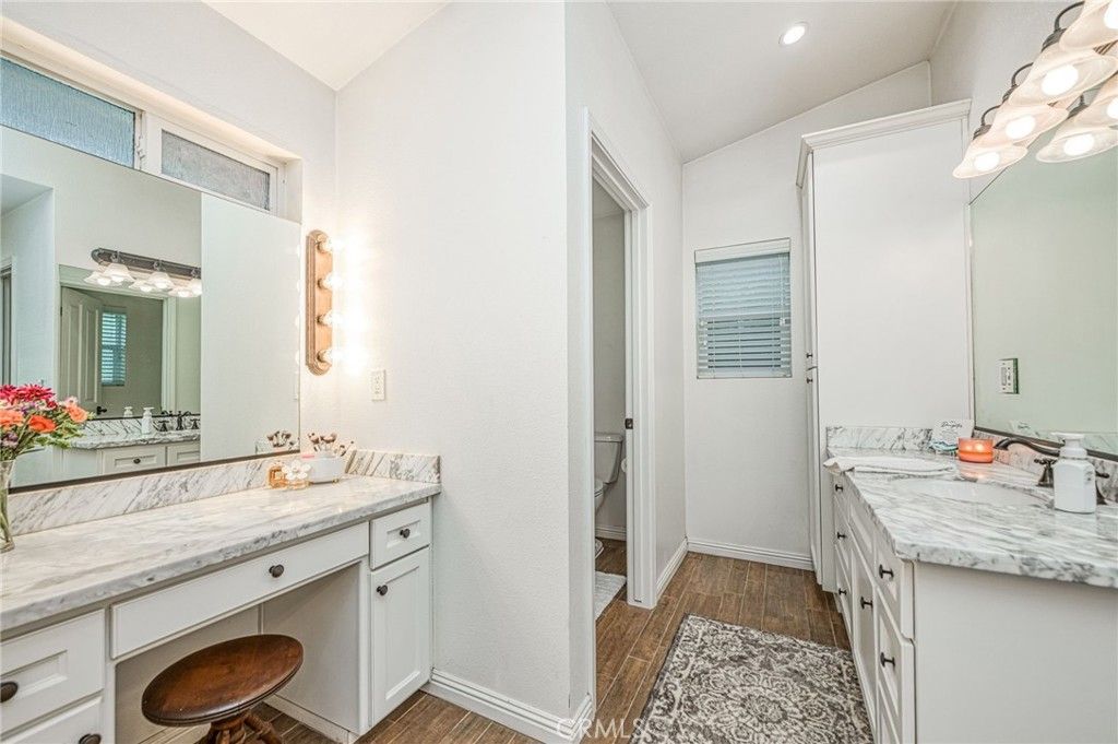 Bathroom, Dual Sink Vanities, Interior, Recessed Lighting, Wood Texture Flooring