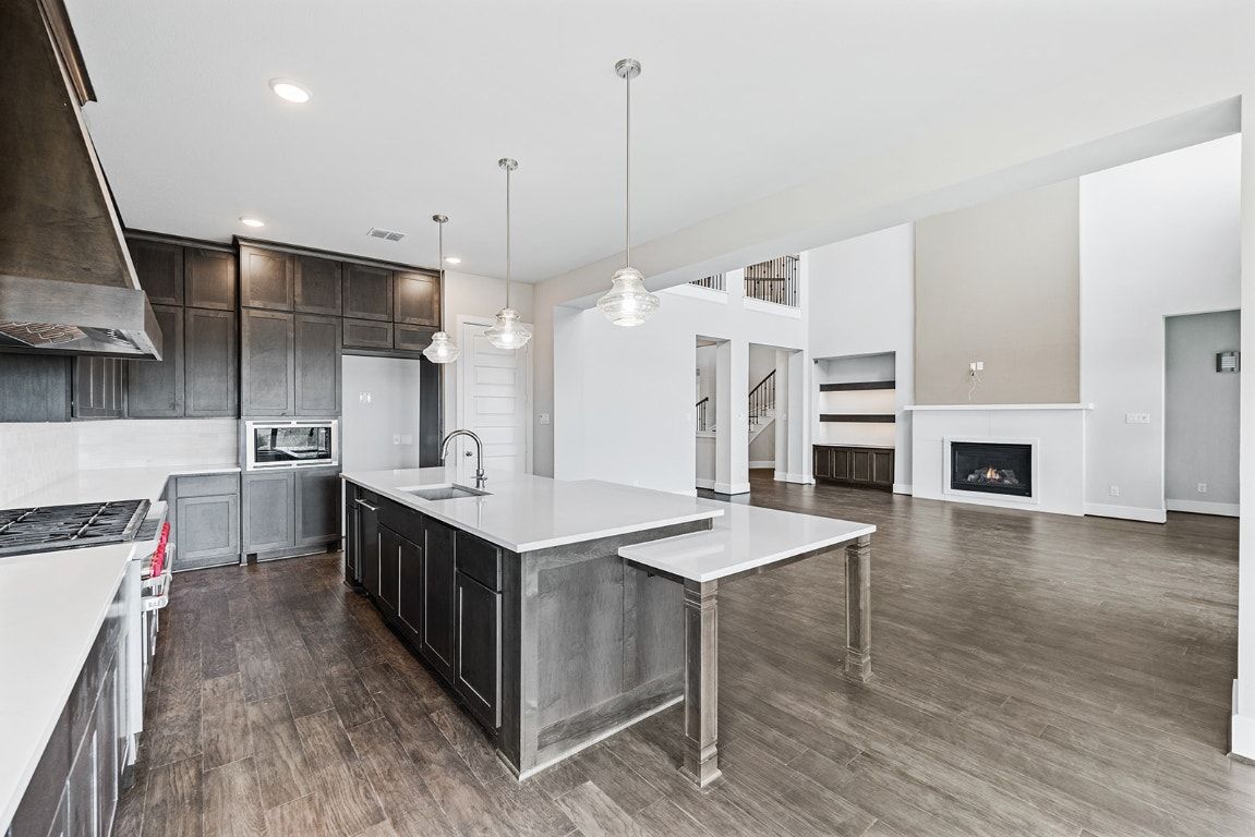 Fireplace, Interior, Kitchen, Pendant Lights, Recessed Lighting, Wood Texture Flooring