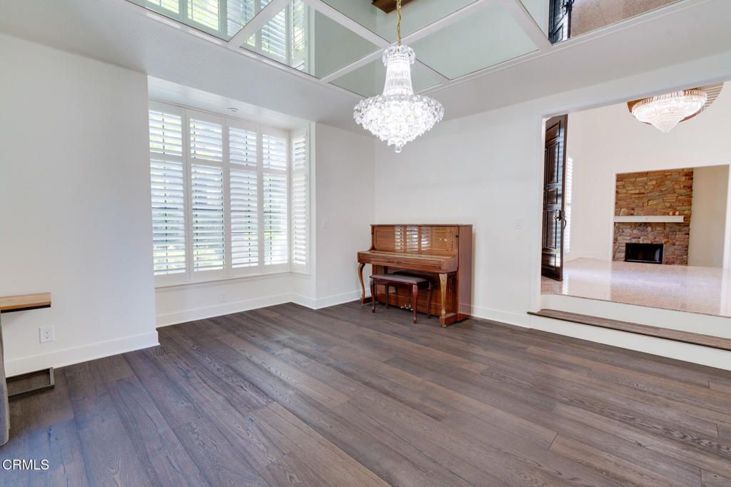 Chandelier, Fireplace, Interior, Piano, Wood Texture Flooring