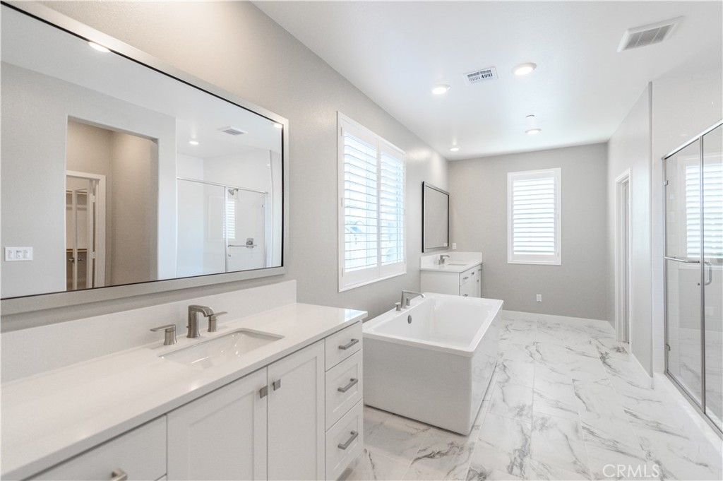 Bathroom, Dual Sink Vanities, Free Standing Baths, Glass Shower, Interior, Marble, Recessed Lighting