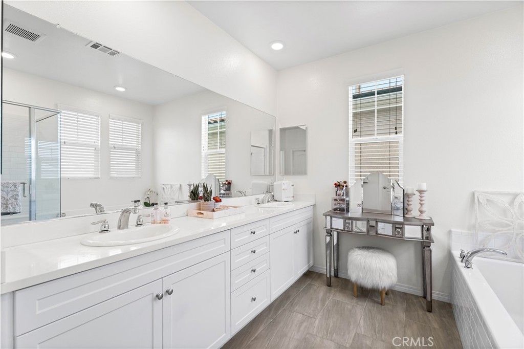 Bathroom, Dual Sink Vanities, Interior, Recessed Lighting, Wood Texture Flooring