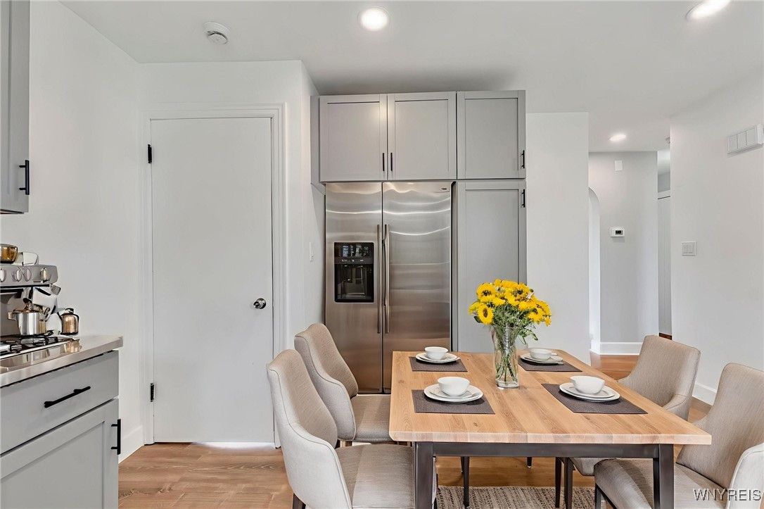 Dining room, Interior, Kitchen, Recessed Lighting, Stainless Steel Appliances, Wood Texture Flooring