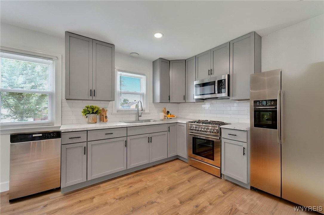 Interior, Kitchen, Recessed Lighting, Stainless Steel Appliances, Wood Texture Flooring