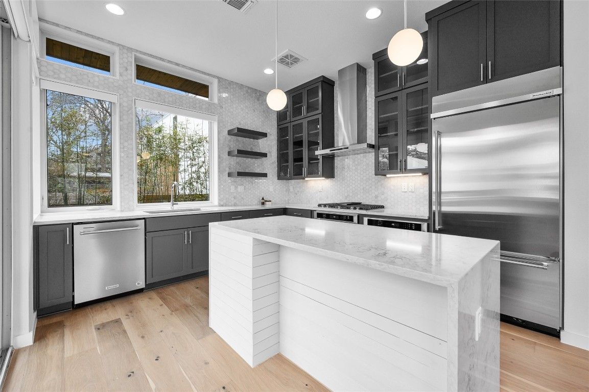 Interior, Kitchen, Pendant Lights, Recessed Lighting, Stainless Steel Appliances, Wood Texture Flooring