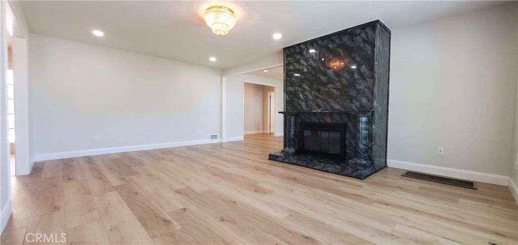 Empty room, Fireplace, Interior, Recessed Lighting, Wood Texture Flooring