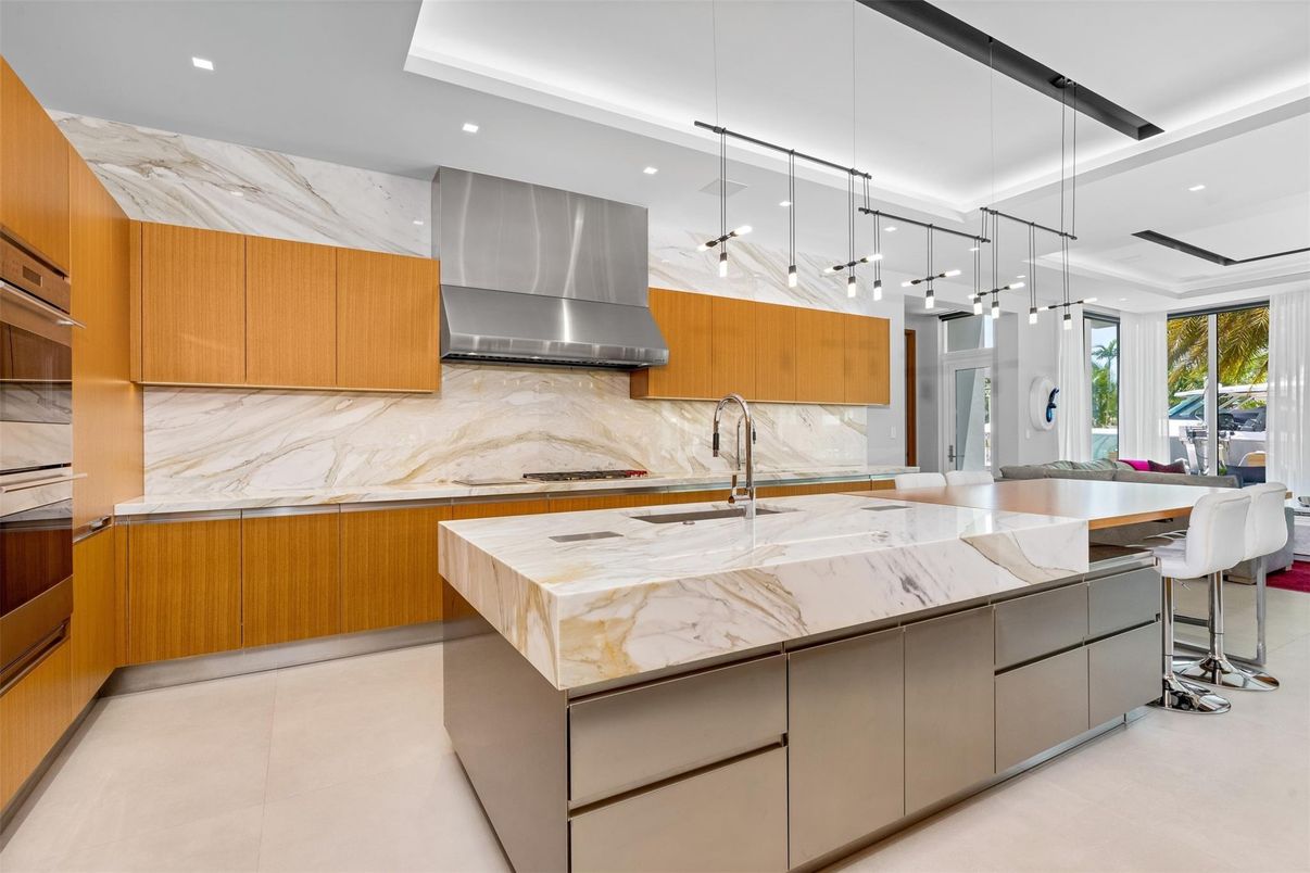 Interior, Kitchen, Marble Walls, Pendant Lights, Recessed Lighting, Stainless Steel Appliances