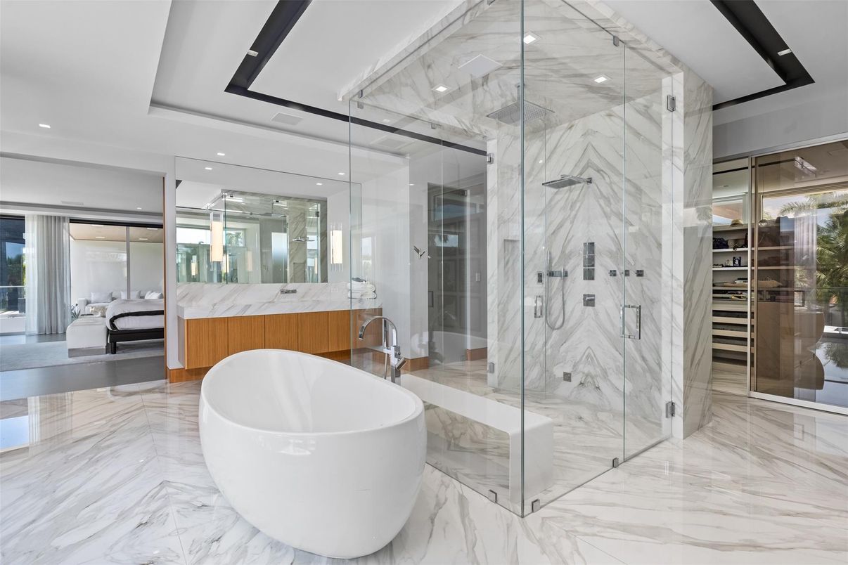 Bathroom, Free Standing Baths, Glass Shower, Interior, Marble, Marble Walls, Recessed Lighting