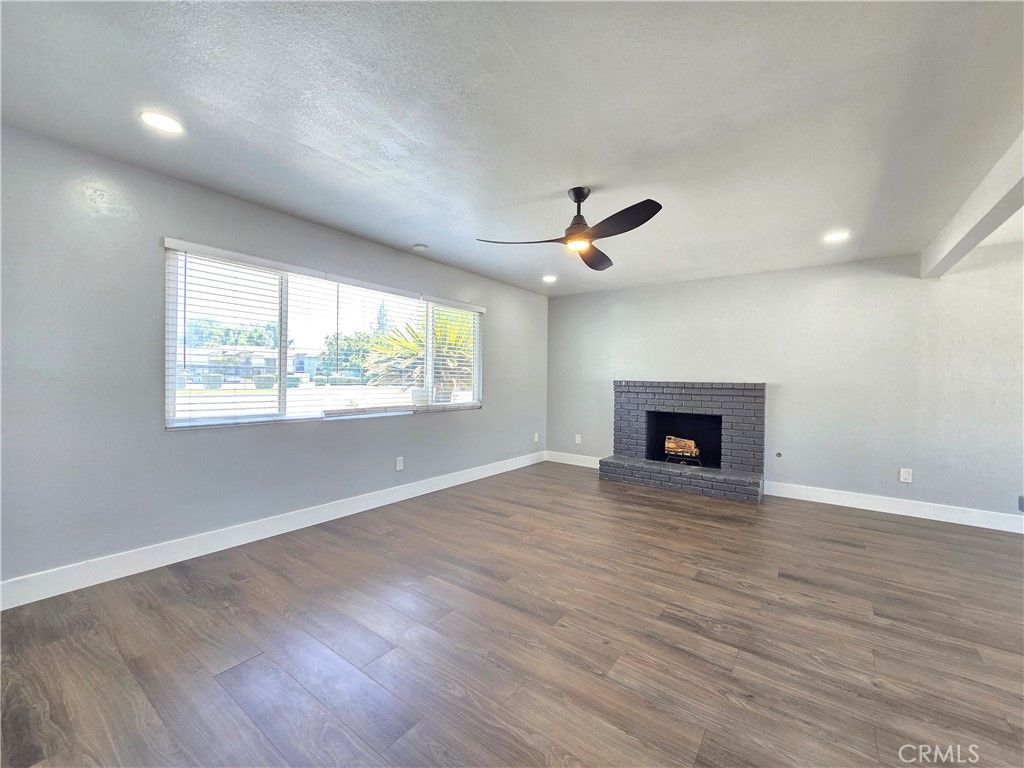 Empty room, Fireplace, Interior, Recessed Lighting, Wood Texture Flooring