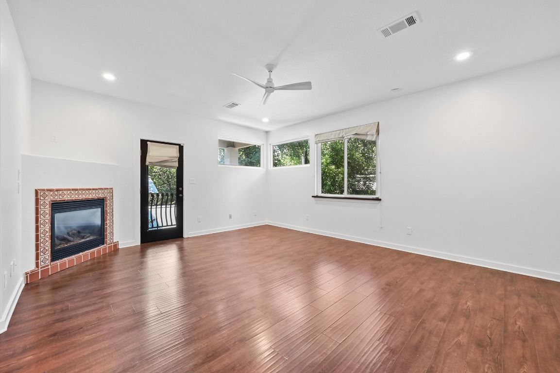 Empty room, Fireplace, Interior, Recessed Lighting, Wood Texture Flooring