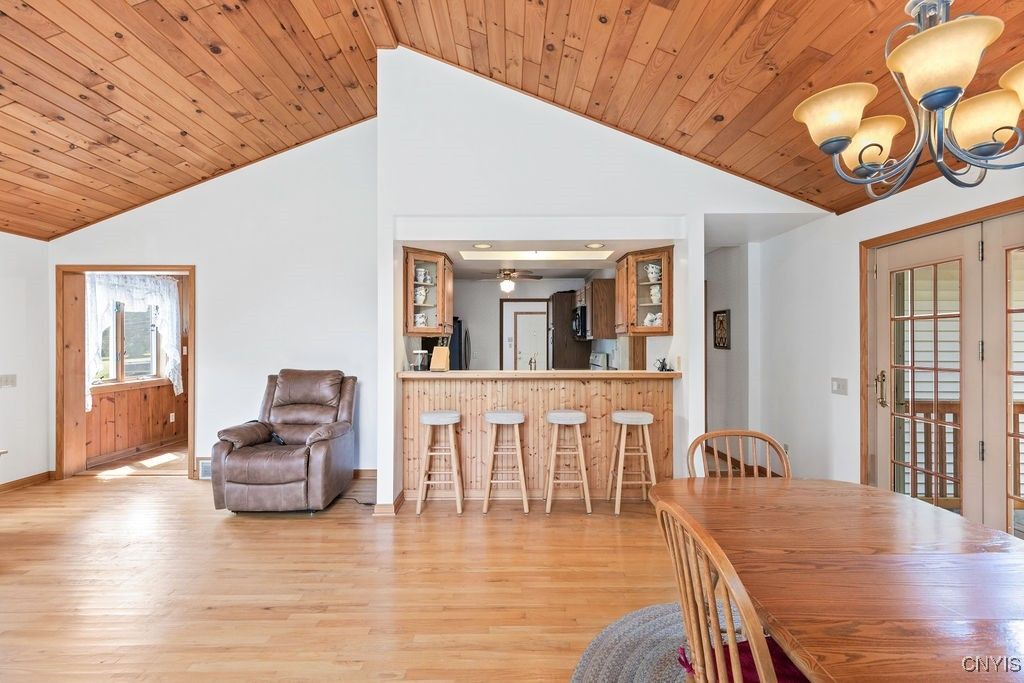 Chandelier, Dining room, Interior, Recessed Lighting, Wooden Ceilings, Wood Texture Flooring