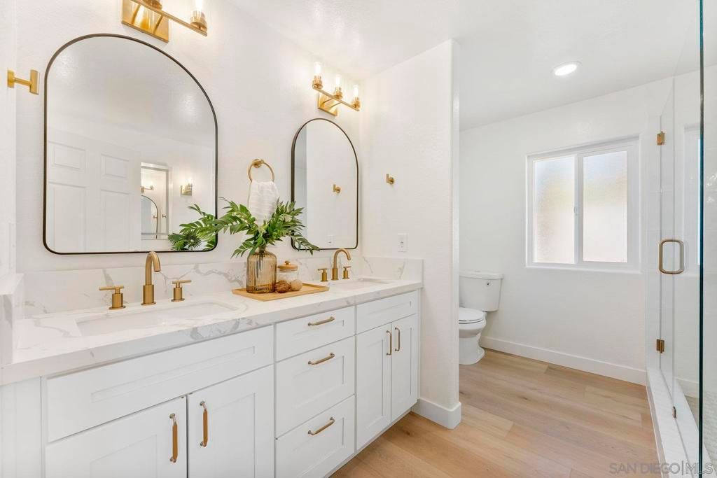 Bathroom, Dual Sink Vanities, Interior, Recessed Lighting, Wood Texture Flooring