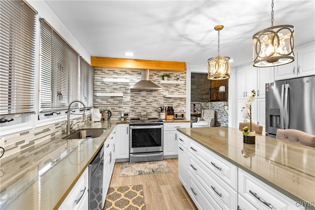 Interior, Kitchen, Pendant Lights, Recessed Lighting, Stainless Steel Appliances, Stone Walls, Wood Texture Flooring