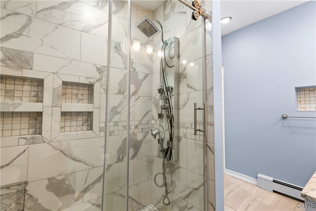 Bathroom, Glass Shower, Interior, Marble Walls, Recessed Lighting, Wood Texture Flooring