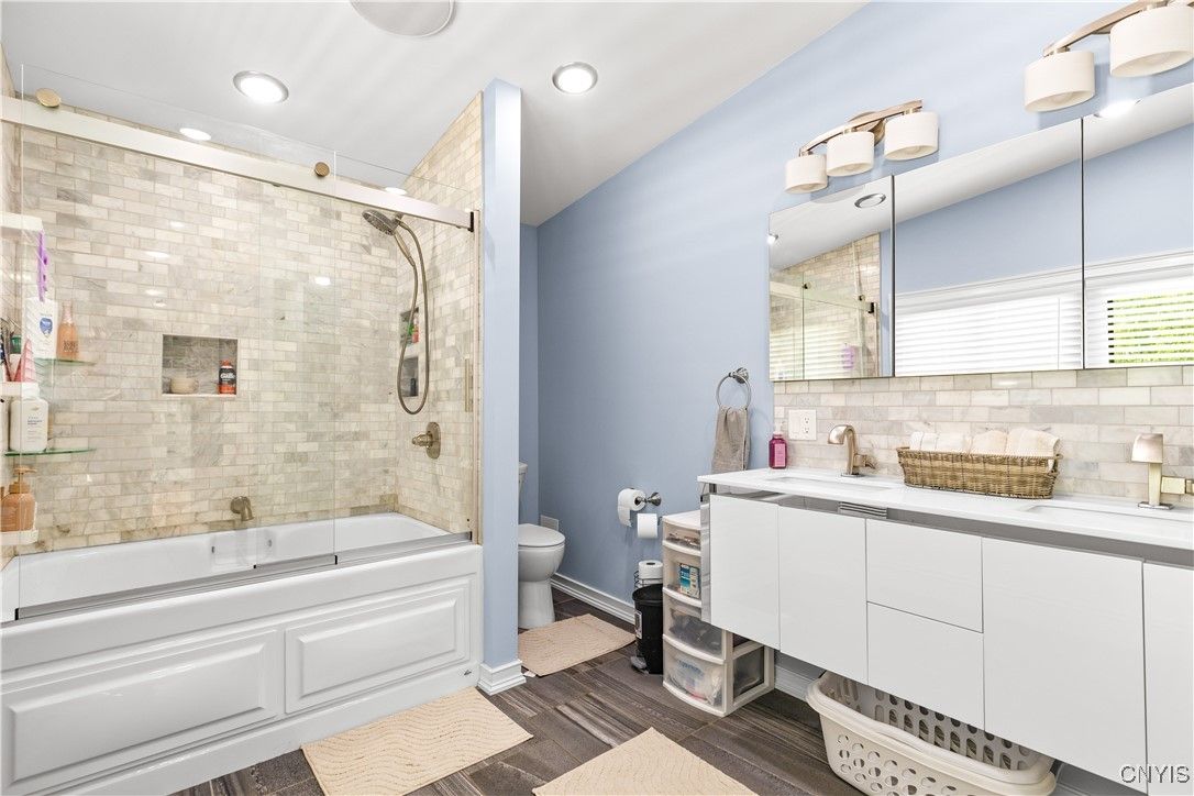 Bathroom, Dual Sink Vanities, Glass Shower, Interior, Recessed Lighting, Wood Texture Flooring