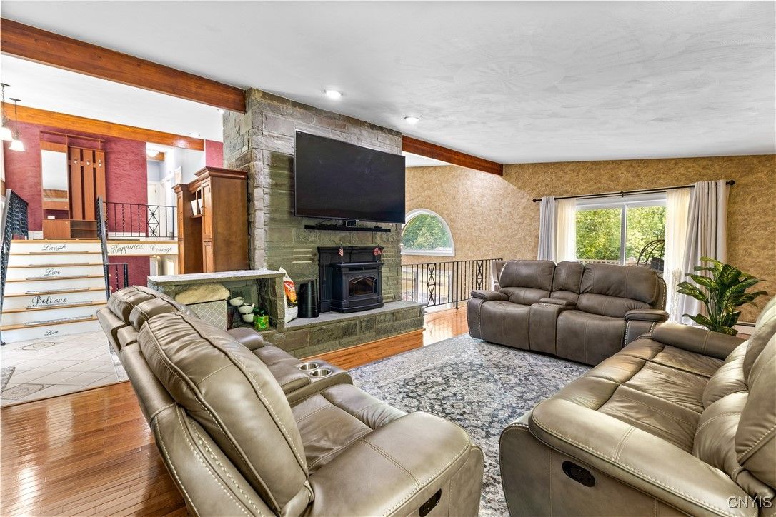 Fireplace, Interior, Living room, Recessed Lighting, Stone Walls, Wooden Beams, Wood Texture Flooring