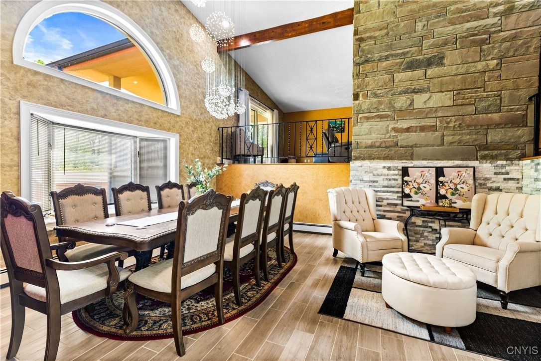 Dining room, Interior, Pendant Lights, Piano, Stone Walls, Wooden Beams, Wood Texture Flooring