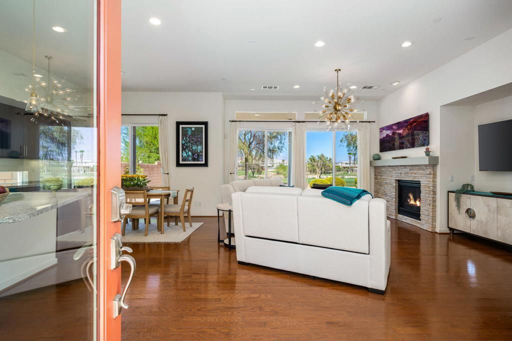 Dining room, Fireplace, Interior, Living room, Pendant Lights, Recessed Lighting, Wood Texture Flooring