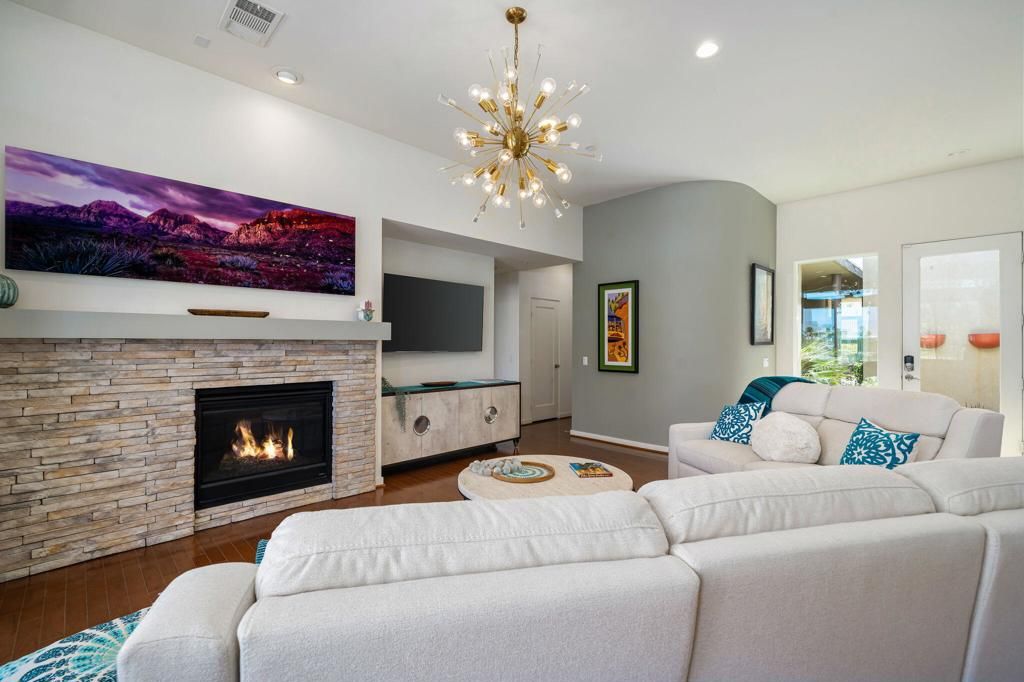 Fireplace, Interior, Living room, Pendant Lights, Recessed Lighting, Stone Walls, Wood Texture Flooring
