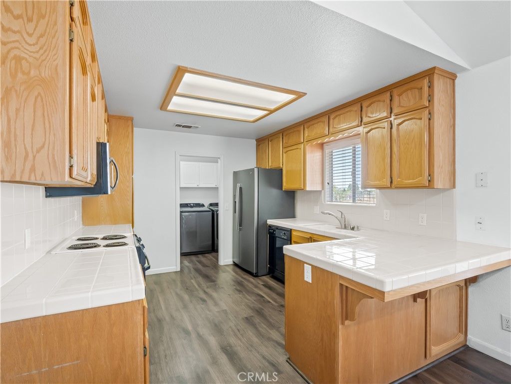 Interior, Kitchen, Tile Countertops, Wood Texture Flooring