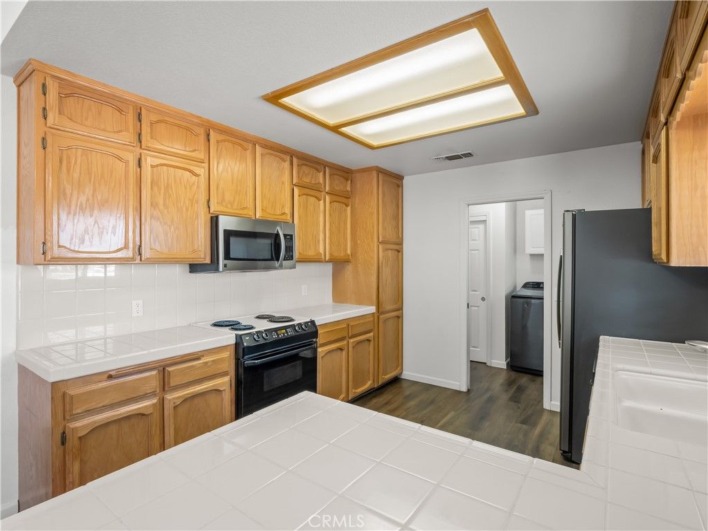 Interior, Kitchen, Tile Countertops, Wood Texture Flooring