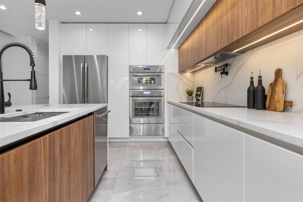 Interior, Kitchen, Marble, Marble Walls, Recessed Lighting, Stainless Steel Appliances
