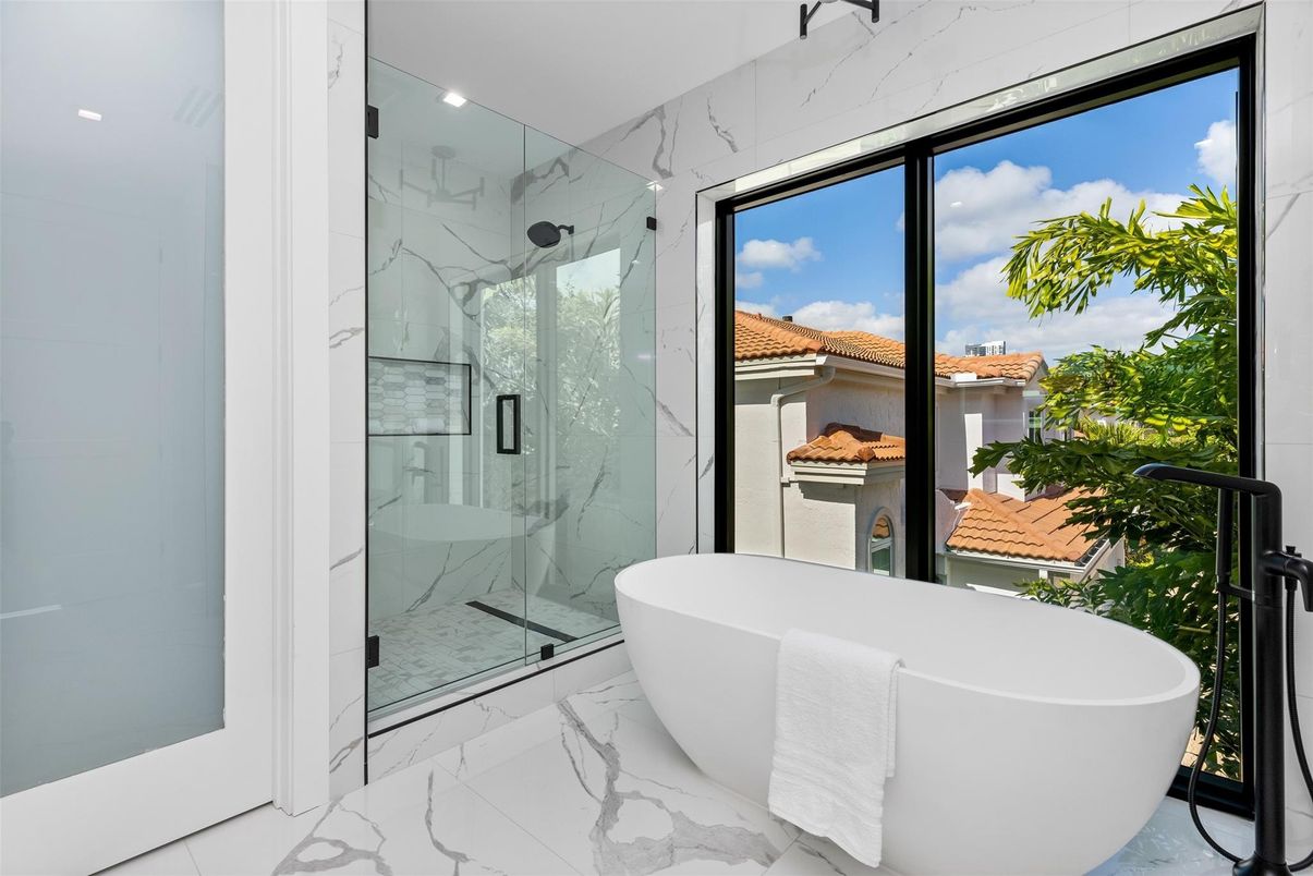 Bathroom, Free Standing Baths, Glass Shower, Interior, Marble, Marble Walls, Recessed Lighting