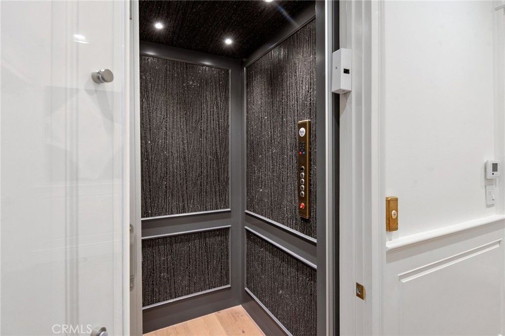 Elevator, Interior, Recessed Lighting, Wood Texture Flooring, Wooden Walls