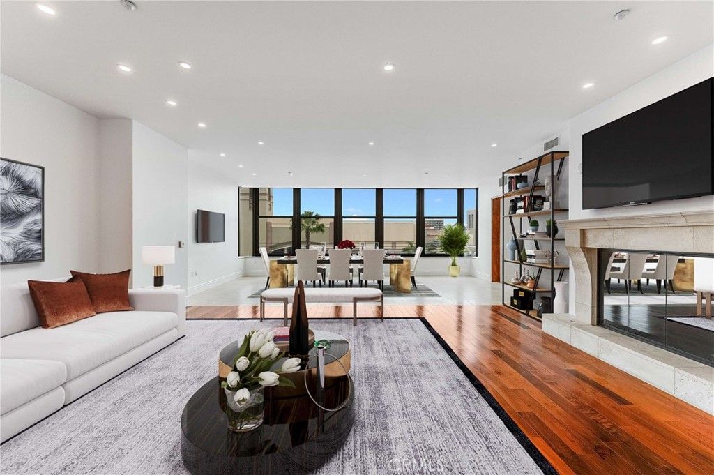 Dining room, Fireplace, Interior, Living room, Recessed Lighting, Wood Texture Flooring