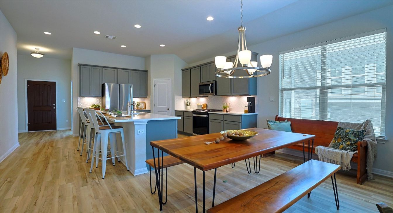 Dining room, Interior, Kitchen, Pendant Lights, Recessed Lighting, Stainless Steel Appliances, Wood Texture Flooring