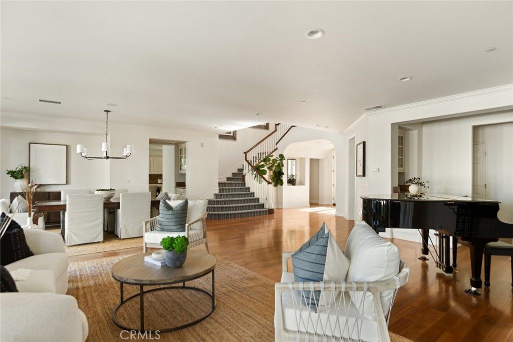 Chandelier, Dining room, Interior, Living room, Piano, Recessed Lighting, Wood Texture Flooring