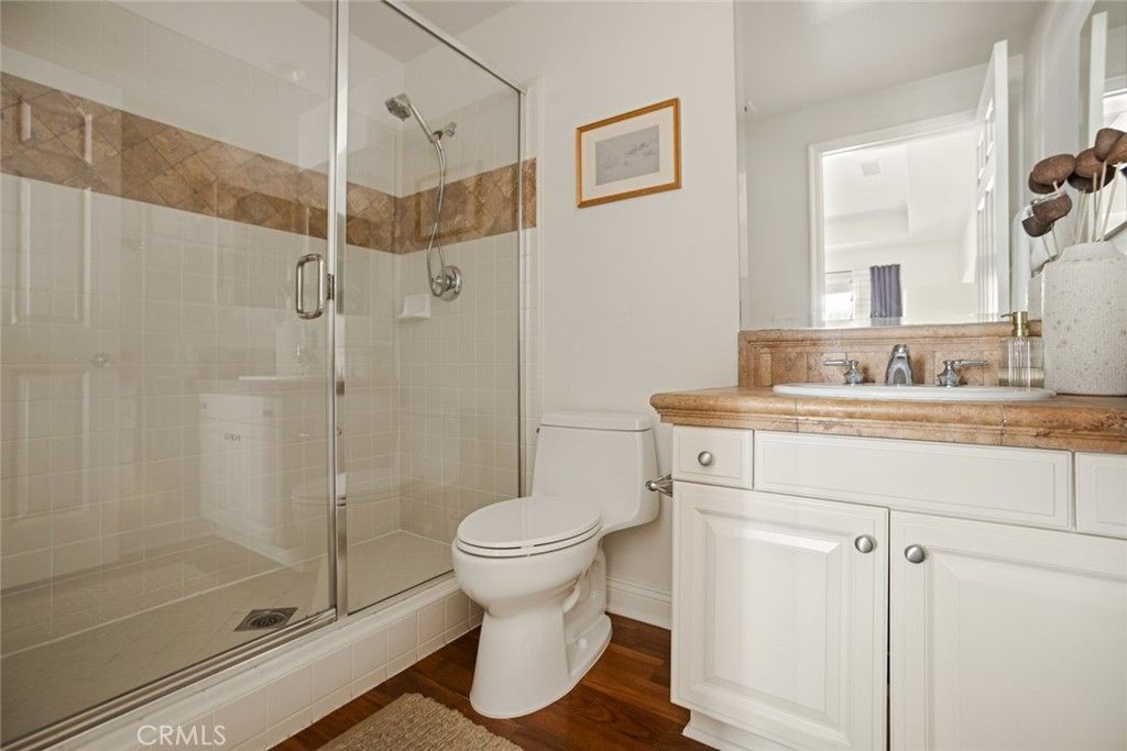 Bathroom, Glass Shower, Interior, Tile Countertops, Wood Texture Flooring