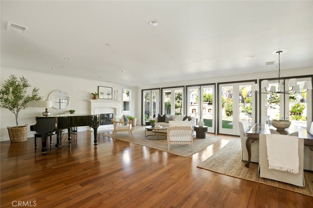 Dining room, Fireplace, Interior, Living room, Pendant Lights, Piano, Recessed Lighting, Wood Texture Flooring