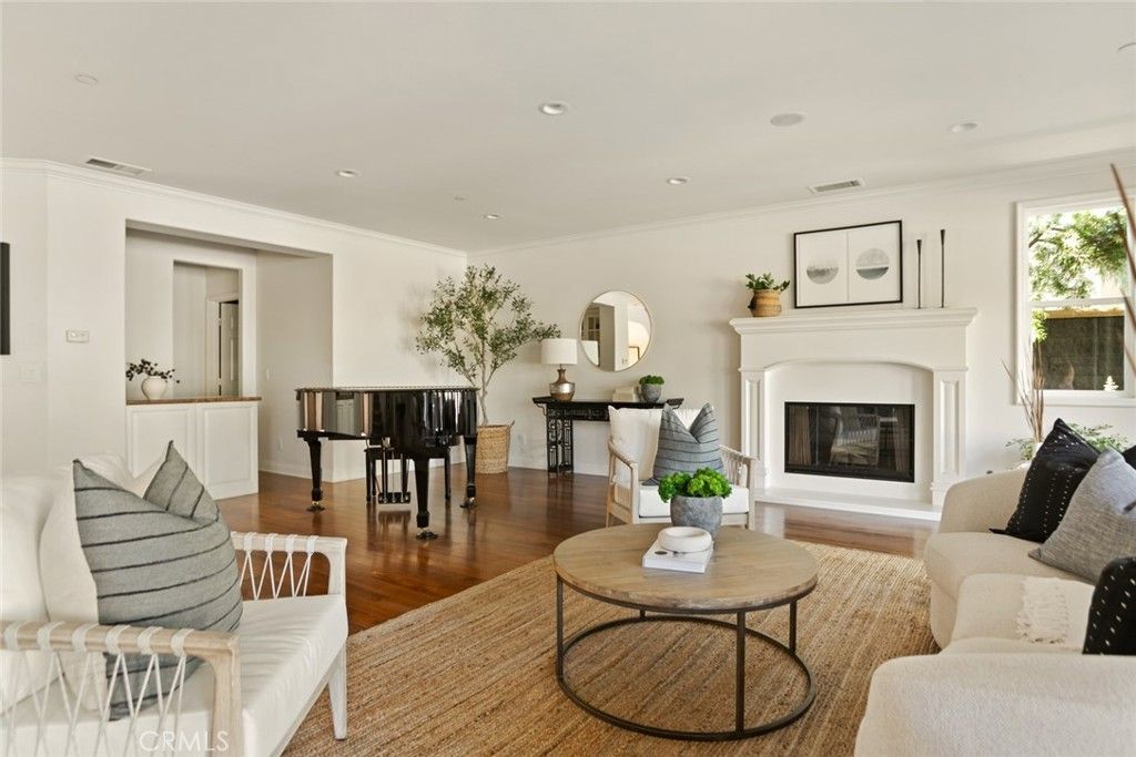 Fireplace, Interior, Living room, Piano, Recessed Lighting, Wood Texture Flooring
