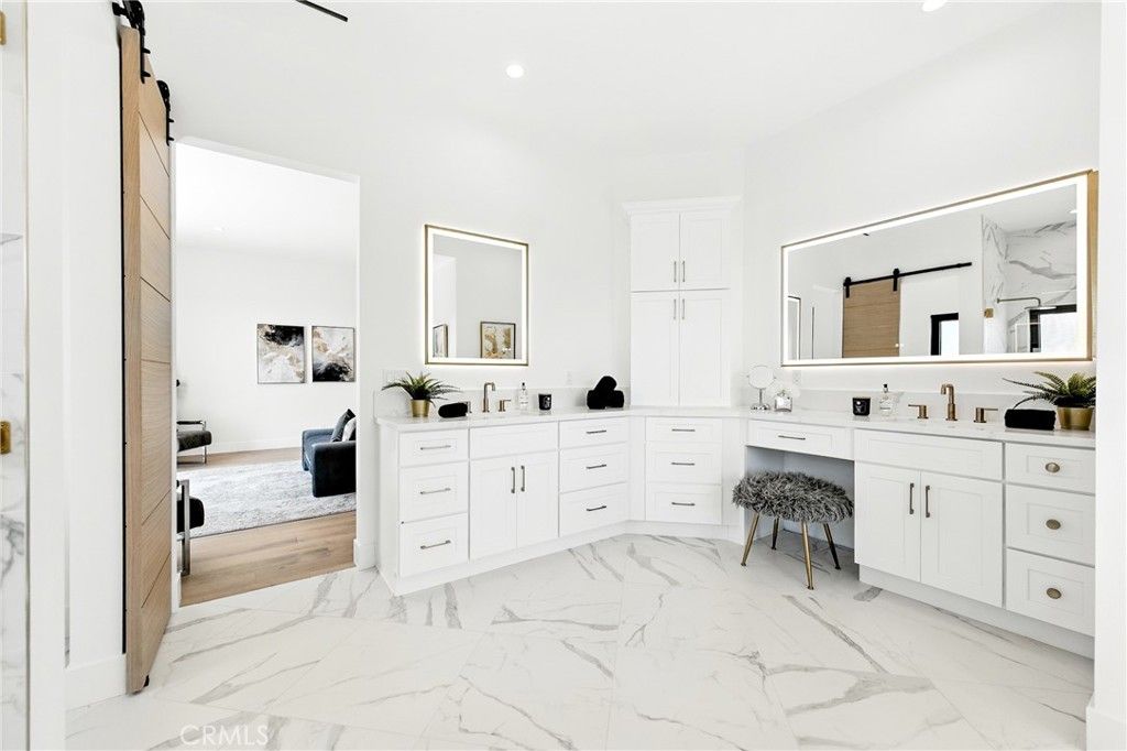 Bathroom, Dual Sink Vanities, Interior, Marble, Recessed Lighting, Wood Texture Flooring