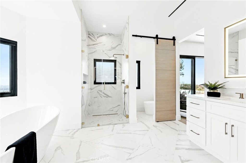 Bathroom, Free Standing Baths, Glass Shower, Interior, Marble, Marble Walls, Recessed Lighting
