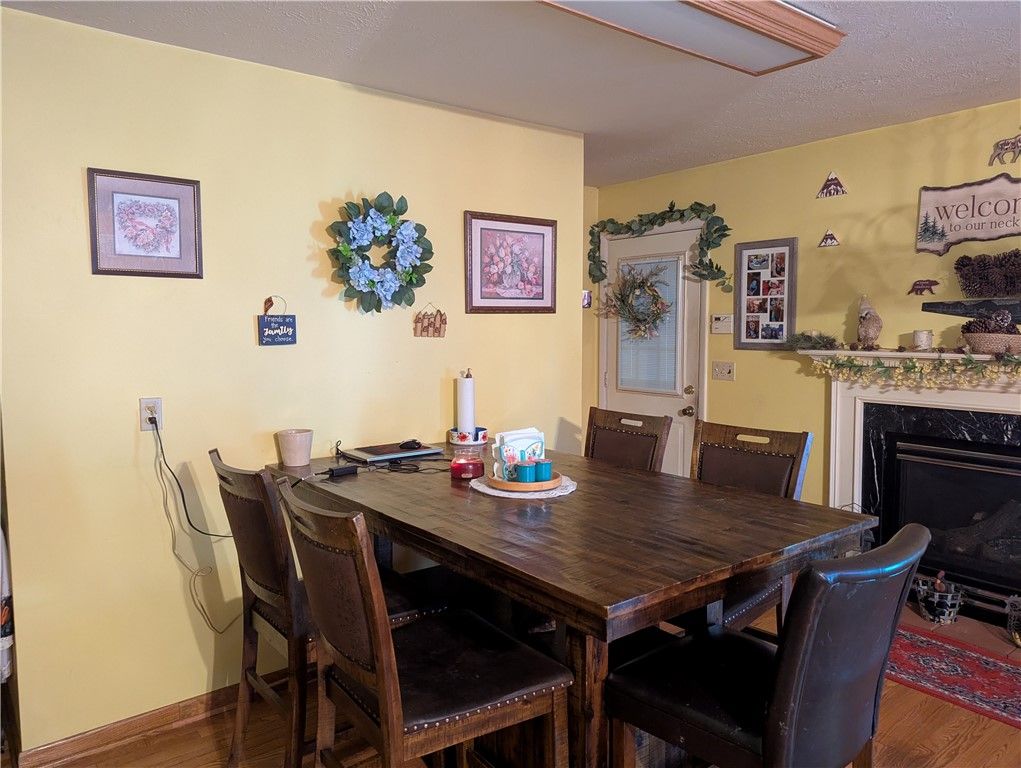 Dining room, Fireplace, Interior, Wood Texture Flooring