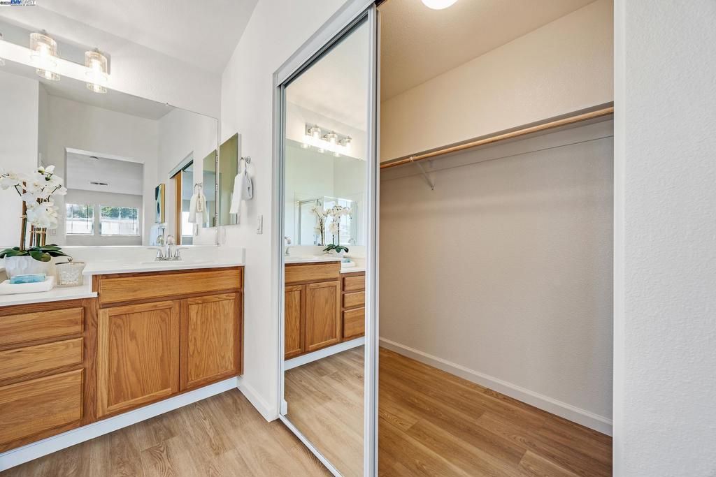 Bathroom, Dual Sink Vanities, Interior, Walk-in Closets, Wood Texture Flooring