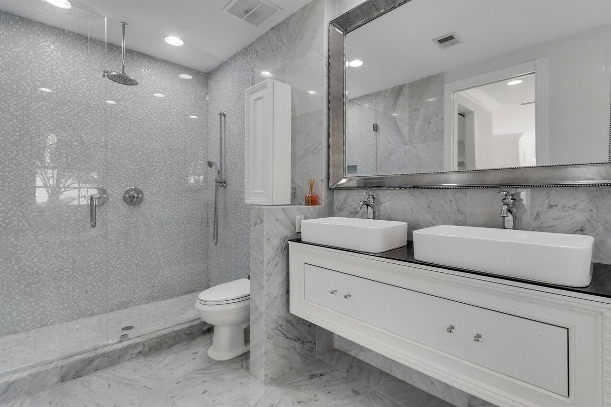 Bathroom, Dual Sink Vanities, Glass Shower, Interior, Marble, Marble Walls, Recessed Lighting
