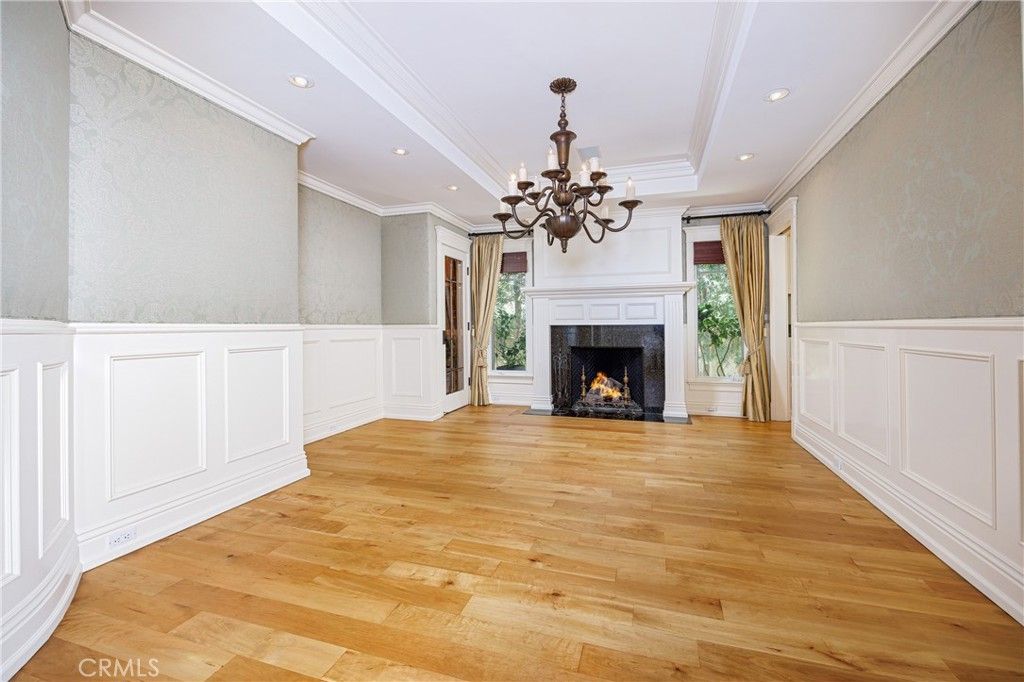 Chandelier, Empty room, Fireplace, Interior, Recessed Lighting, Wood Texture Flooring